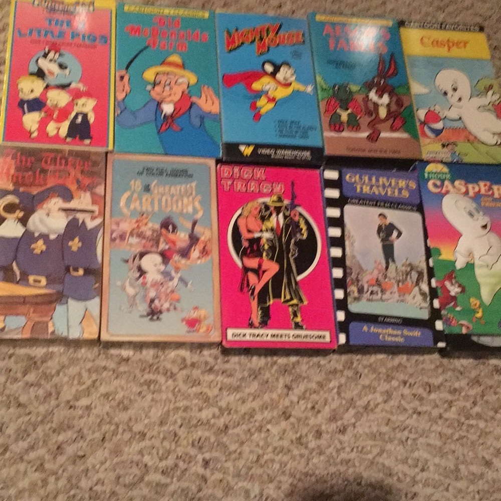 Bundle of 10 vintage children’s cartoons on video cassettes, two are sealed